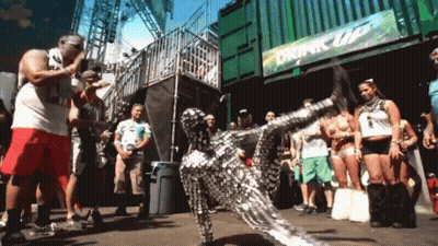 Group Of People In Front Of Drink Up Sign GIF