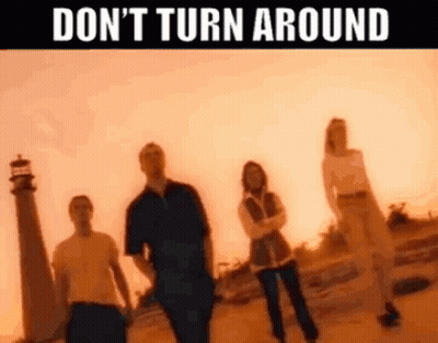 Group Of People In Front Of Lighthouse Don't Turn Around GIF