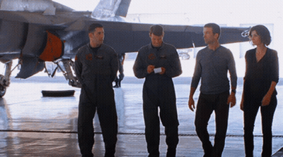 Group Of People In Front Of Plane With C Tail GIF