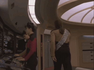 Group Of People In Room With Circular Ceiling GIF