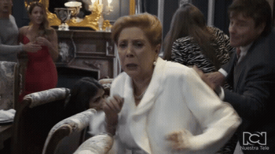 Group Of People In Room With Nuestra Tele GIF