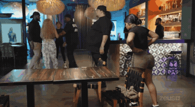 Group Of People In Room With Word Zeus GIF