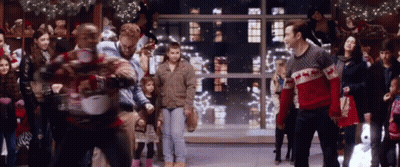 Group Of People In Ugly Sweaters Dancing GIF
