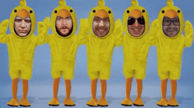 Group Of People In Yellow Duck Costumes GIF
