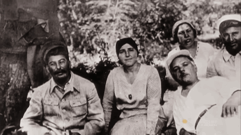 Group Of People Including Man In White Hat GIF