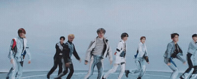 Group Of People Jumping In Circle GIF