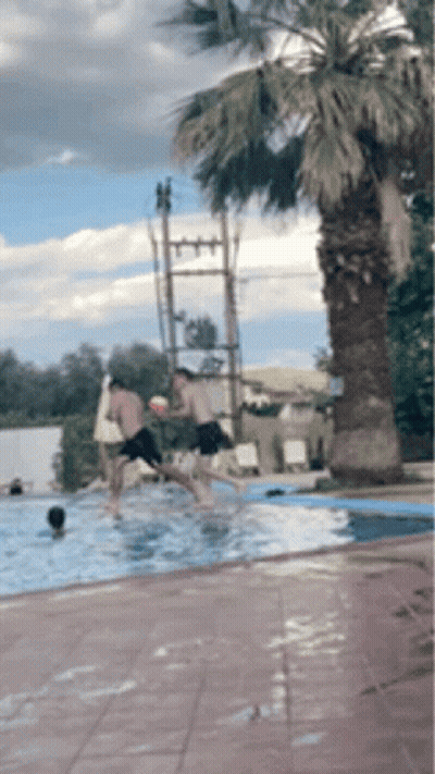 Group Of People Jumping Into Pool GIF