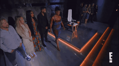 Group Of People On Stage With Letter E GIF