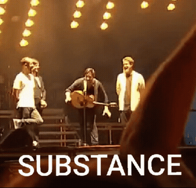 Group Of People On Stage With Substance GIF