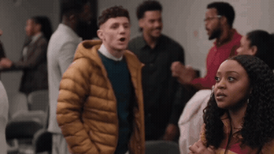 Group Of People One In Yellow Jacket GIF