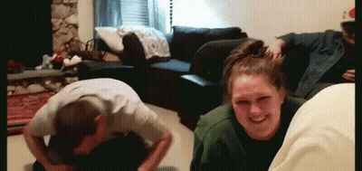 Group Of People Playing In Living Room GIF