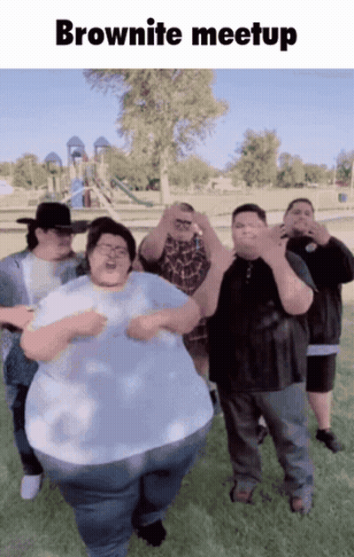 Group Of People Posing At Brownite Meetup GIF