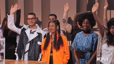 Group Of People Raising Hands With Netflix Logo GIF