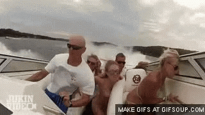 Group Of People Riding Boat GIF