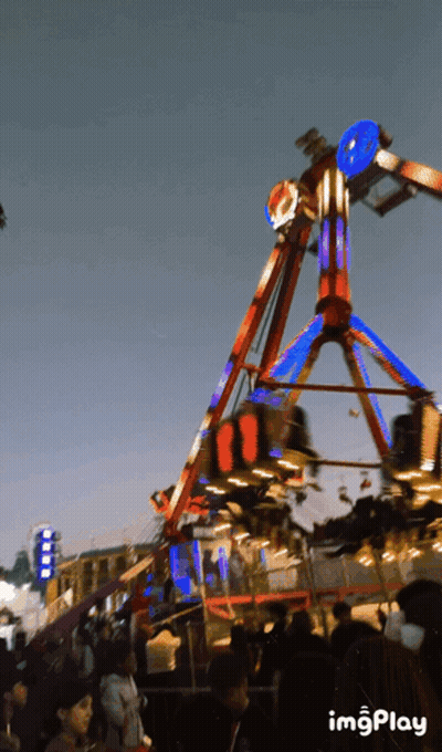 Group Of People Riding Ferris Wheel At Amusement Park Says Imgplay GIF