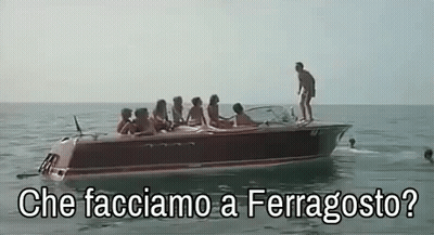 Group Of People Riding In A Boat On The Ocean GIF