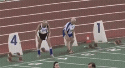 Group Of People Running On Track With Numbers 1-4 GIF
