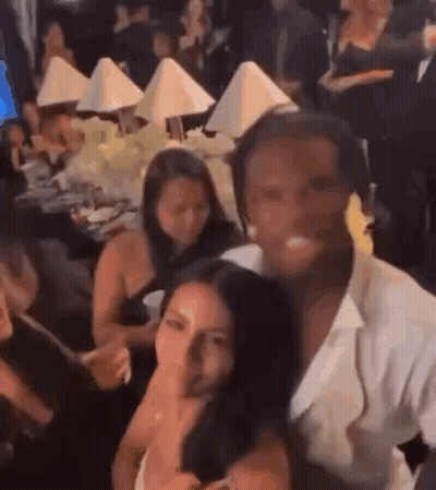 Group Of People Sitting At Tables GIF