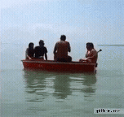 Group Of People Sitting In A Boat GIF