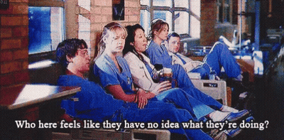 Group Of People Sitting In A Row GIF