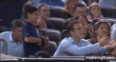 Group Of People Sitting In A Stadium GIF