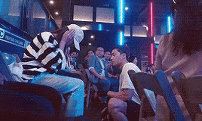 Group Of People Sitting In Chairs GIF