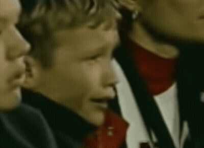 Group Of People Sitting In Stadium Watching Game GIF