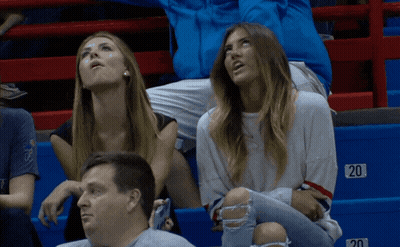 Group Of People Sitting In Stadium With Number 20 GIF