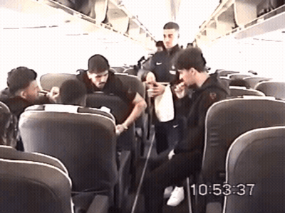 Group Of People Sitting On A Plane At 10:53 GIF