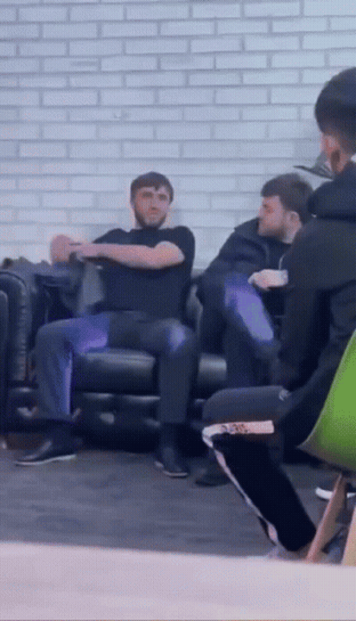 Group Of People Sitting On Couch Talking GIF