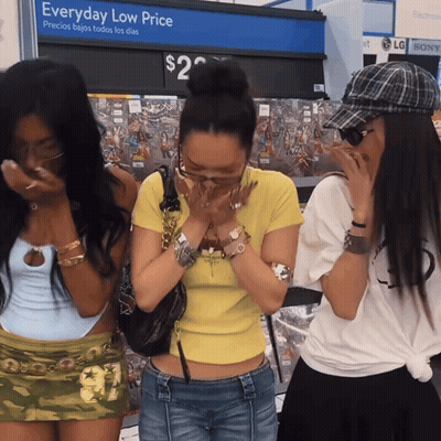 Group Of People Standing Around Man At Laptop GIF