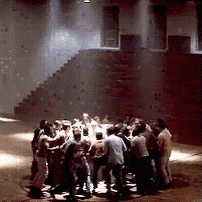 Group Of People Standing In A Circle GIF