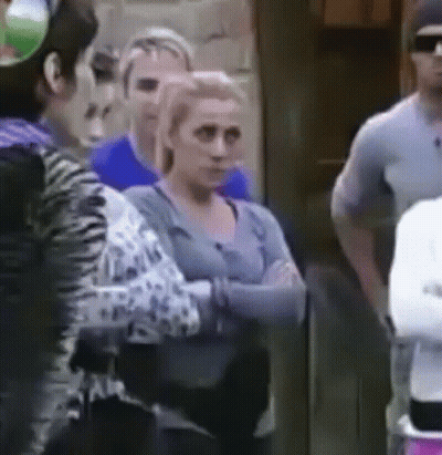 Group Of People Standing In A Line GIF