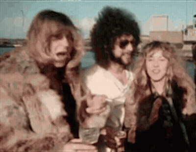 Group Of People Standing In Blurred Photo GIF
