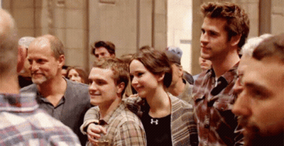 Group Of People Standing In Crowd GIF