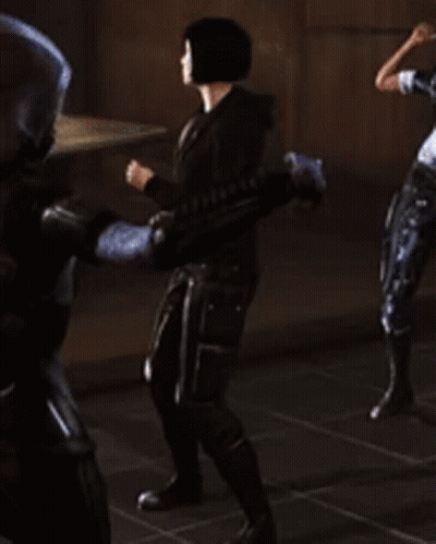 Group Of People Standing In Dark Room GIF