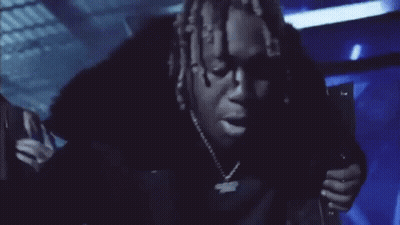 Group Of People Standing In Dark Room GIF