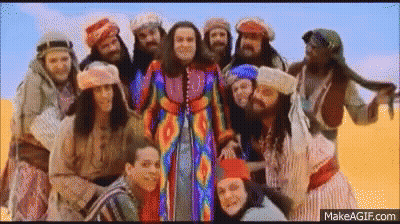 Group Of People Standing In Desert GIF