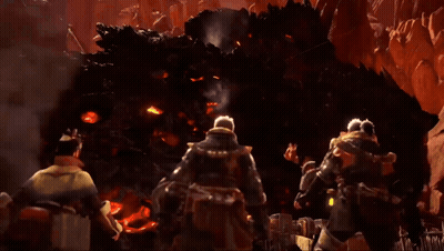 Group Of People Standing In Front Of Large Rock GIF