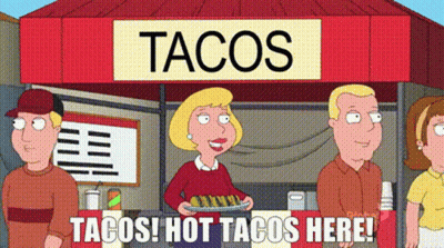 Group Of People Standing In Front Of Taco Stand GIF