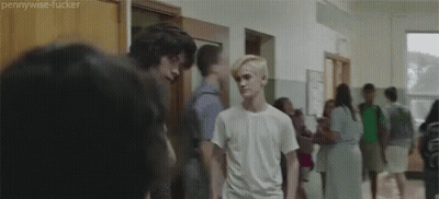 Group Of People Standing In Hallway GIF