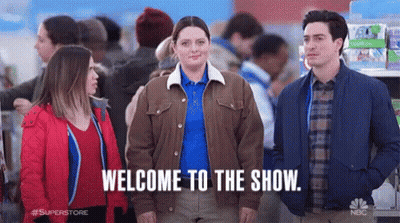 Group Of People Standing In Line With Woman In Middle GIF
