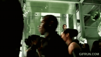 Group Of People Standing In Room With Gifrun.com GIF