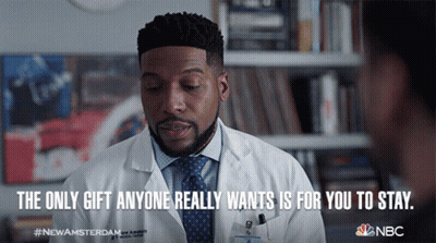 Group Of People Standing In Room With NBC GIF