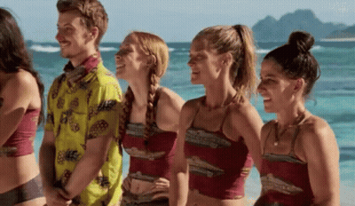 Group Of People Standing On Beach GIF