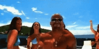 Group Of People Standing On Boat GIF