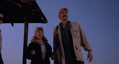 Group Of People Standing Under Roof Looking Up GIF