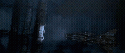 Group Of People Swimming In Room With Blue Light GIF