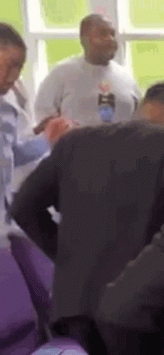 Group Of People Talking In Purple Chairs GIF