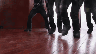 Group Of People Walking On Wood Floor GIF